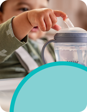 [Translate to Spanish (Reborn):] Baby with Learner straw