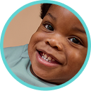 [Translate to Spanish (Reborn):] Babys smile