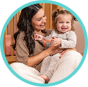 [Translate to Spanish (Reborn):] Mother with baby