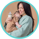 [Translate to Spanish (Reborn):] Mother with Baby and bottle