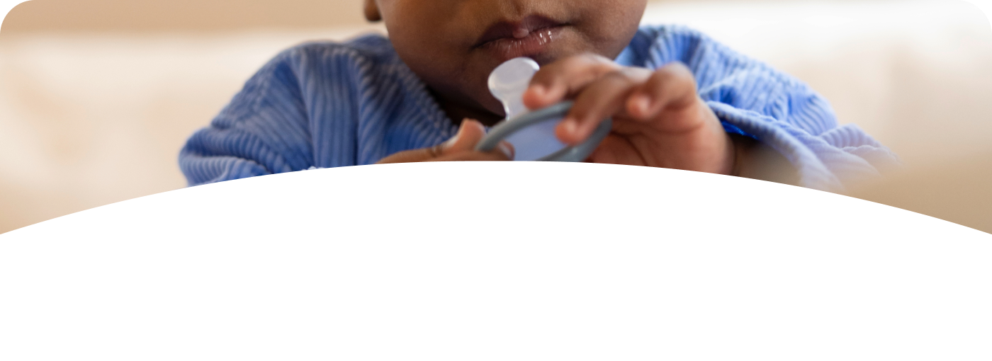 [Translate to Spanish (Reborn):] Baby with soother